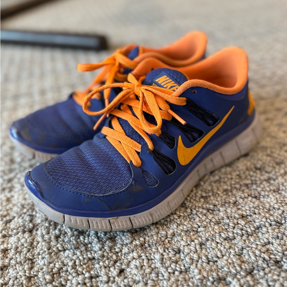 Nike Blue and Orange Sneakers with Breathable Mesh and Padded Tongue